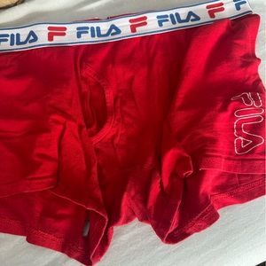 Used men’s red fila boxer trunks.
